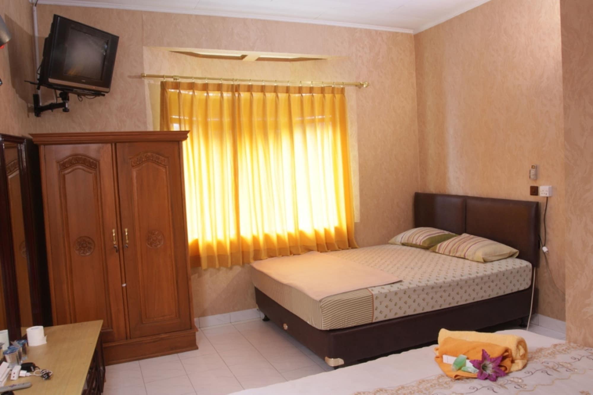 Hotel Orange Homes Syariah - Zuzu
